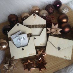 Pengegave i tr� kuvert